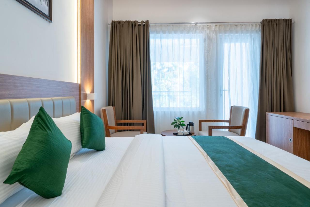 Hotel Panoramic Kochi Buitenkant foto